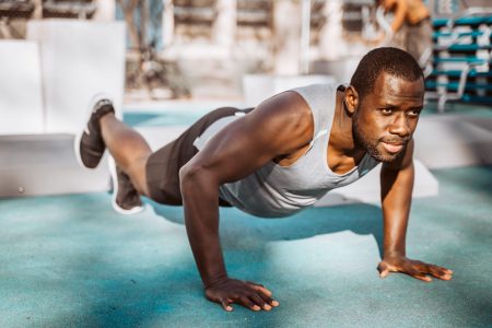 Man doing one leg Push-up