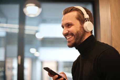 Boy happy listening to music by pexels-andrea-piacquadio-901236